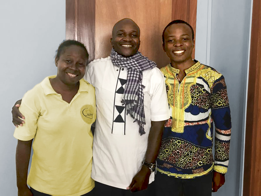 Christian Science nurse Angele Zeh with ABF representatives Lamech and Dominique Bita’a in Douala, Cameroon